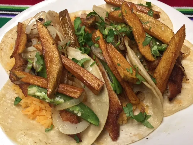 Tacos placeros with potato and cilantro