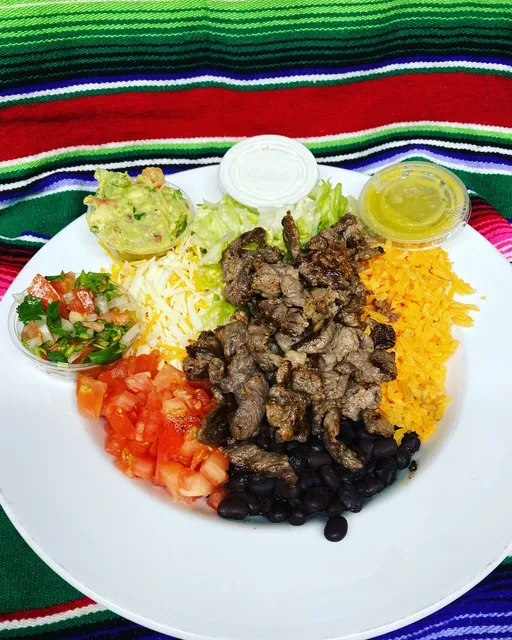 Burrito bowl with steak, black beans and pico de gallo
